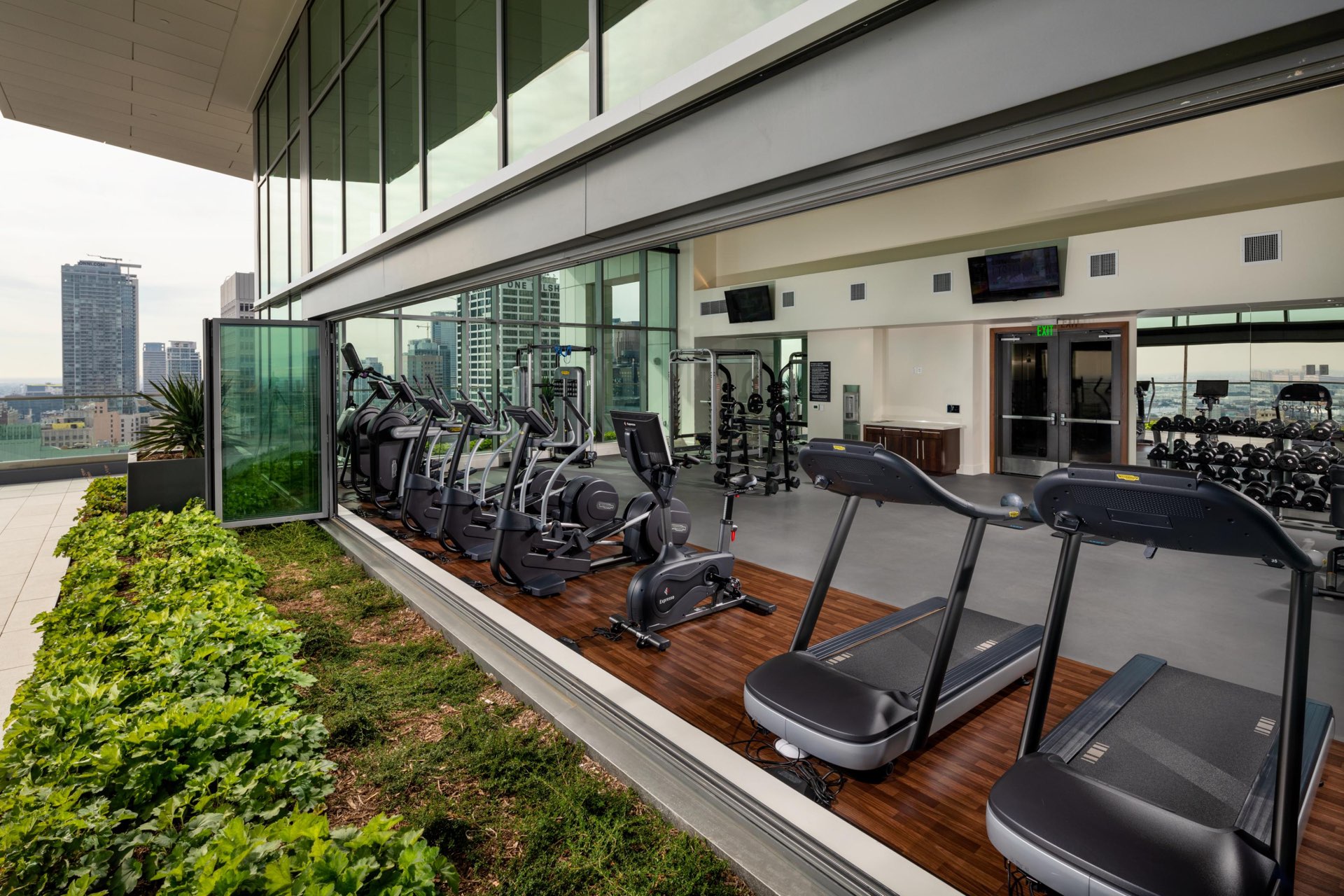 Fitness center with sliding wall