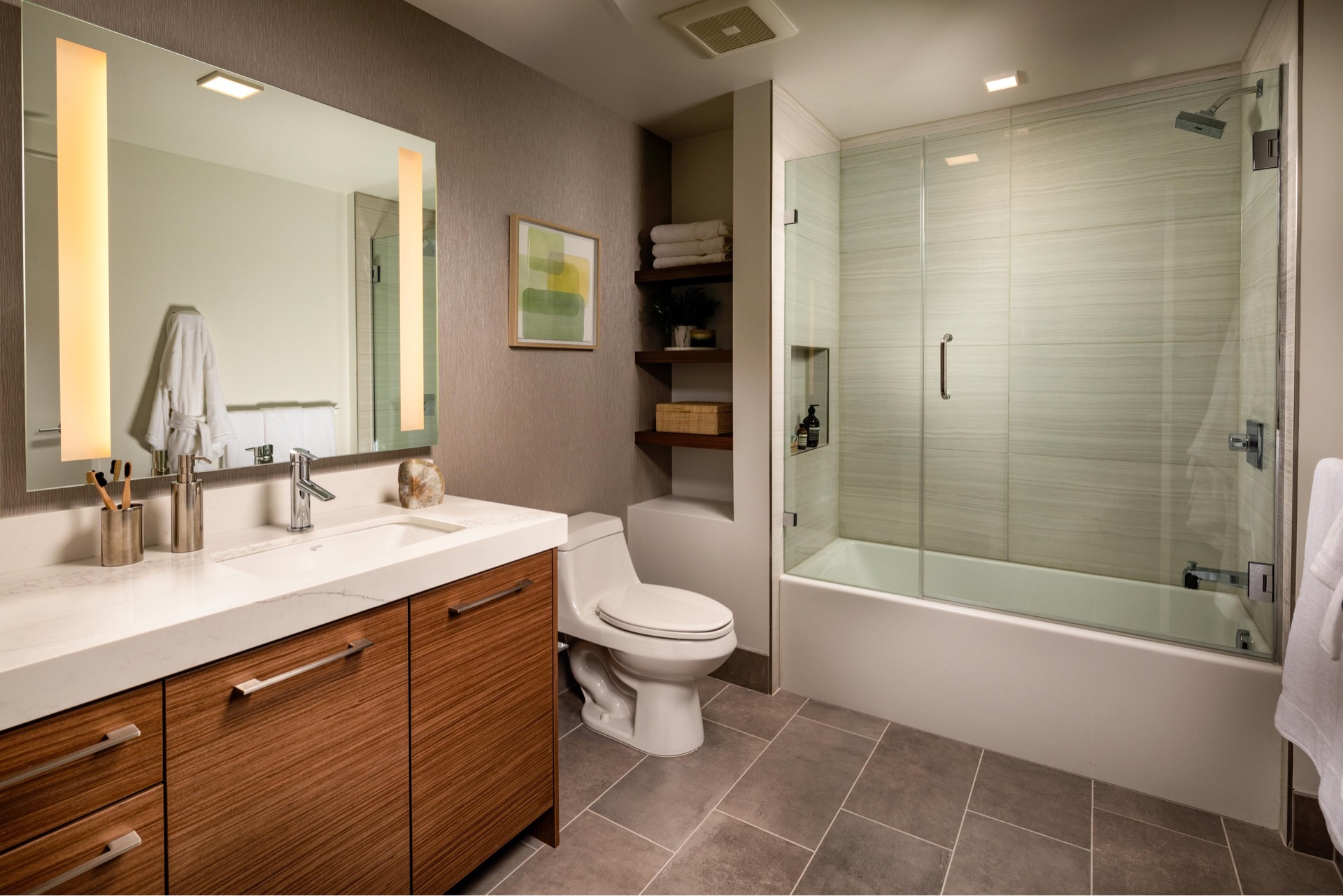 Bathroom with large vanity space and porcelian tile